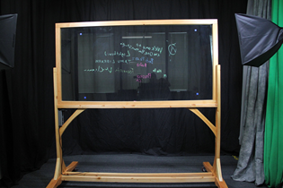 Lightboard, a glass board with writing on it