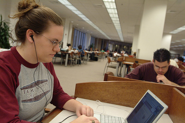 student with equipment