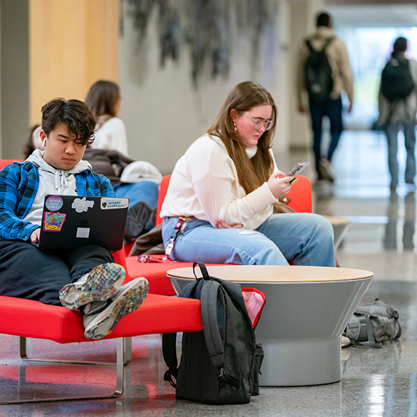 students at open house studying